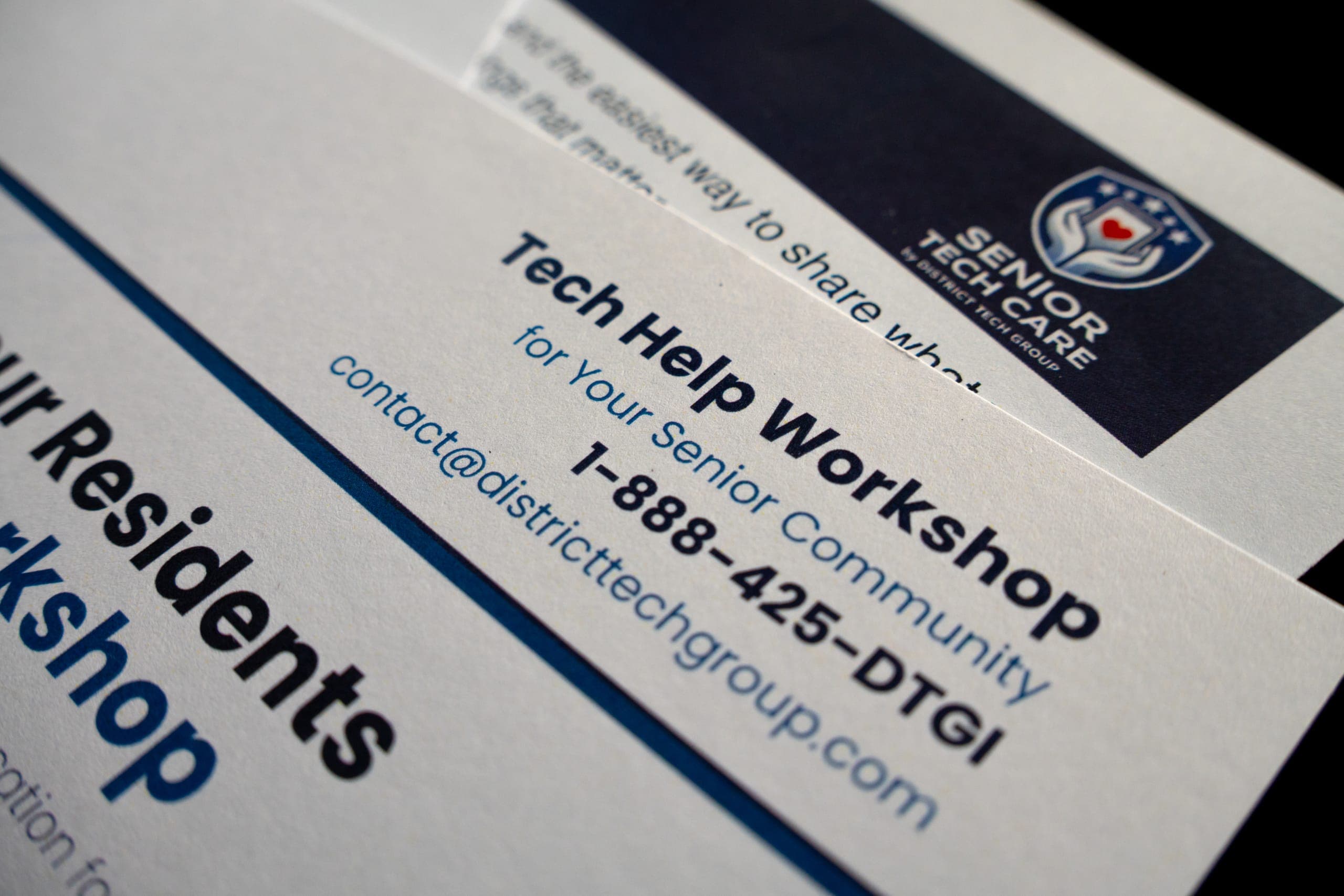 Printed handouts and reference materials prepared for a senior tech workshop